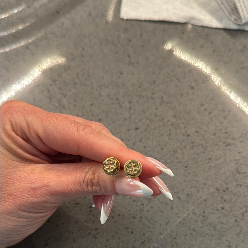 Iconic Tory Burch stud earrings.